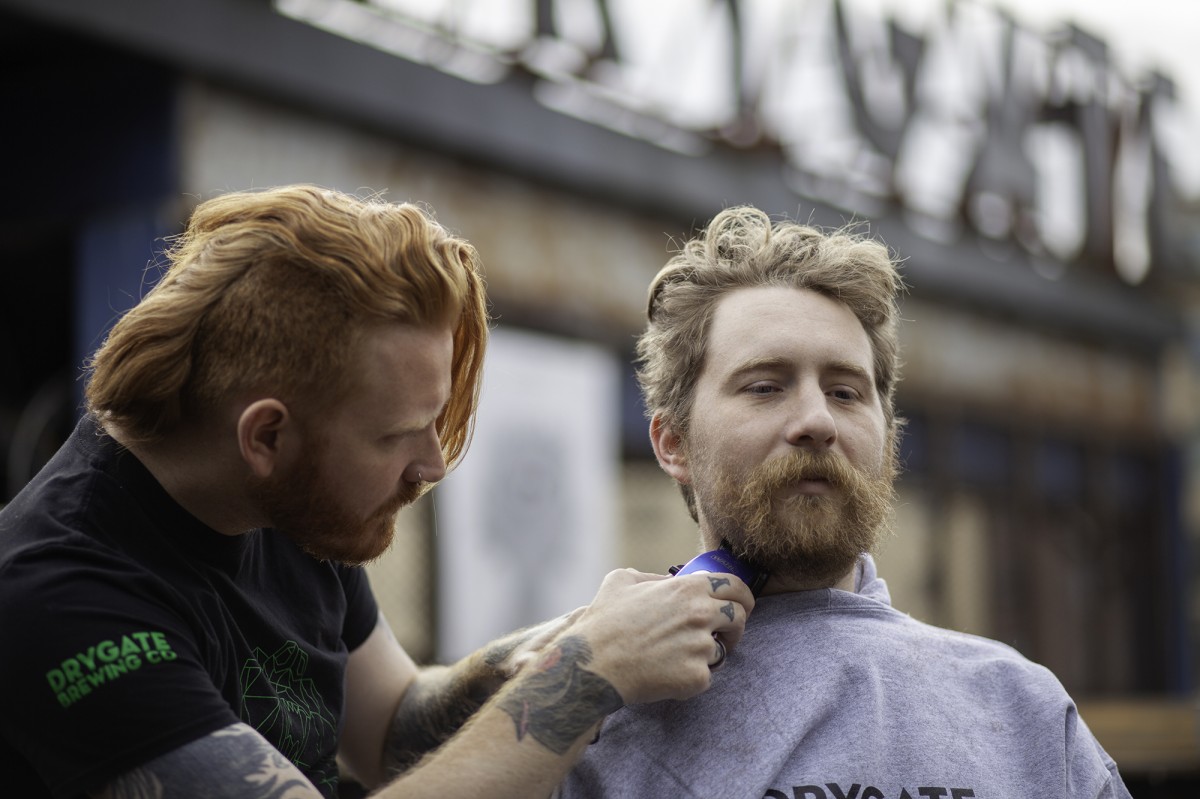 Tom from Northern Monk getting shaved
